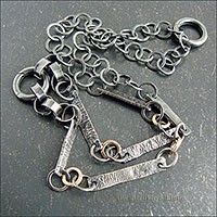 Комбинированная фактурная цепь-ожерелье.