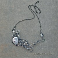серебряное ожерелье с жемчугом